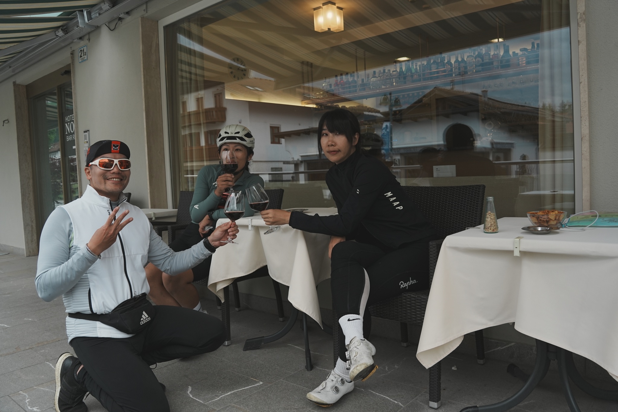 Cyclists relaxing together after a day on the road