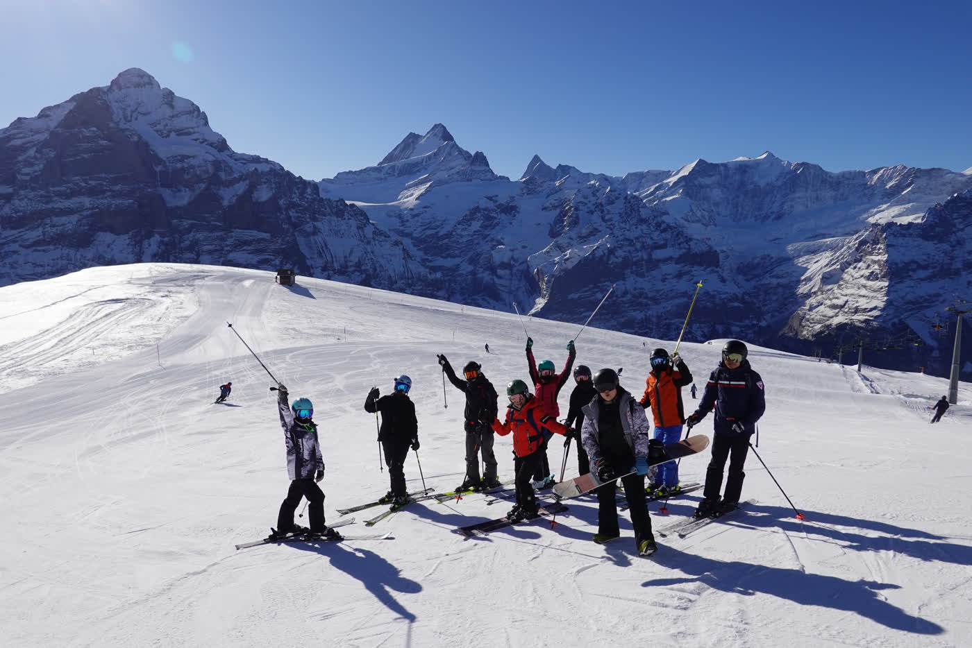 Group of skiers beneath the Eiger massif