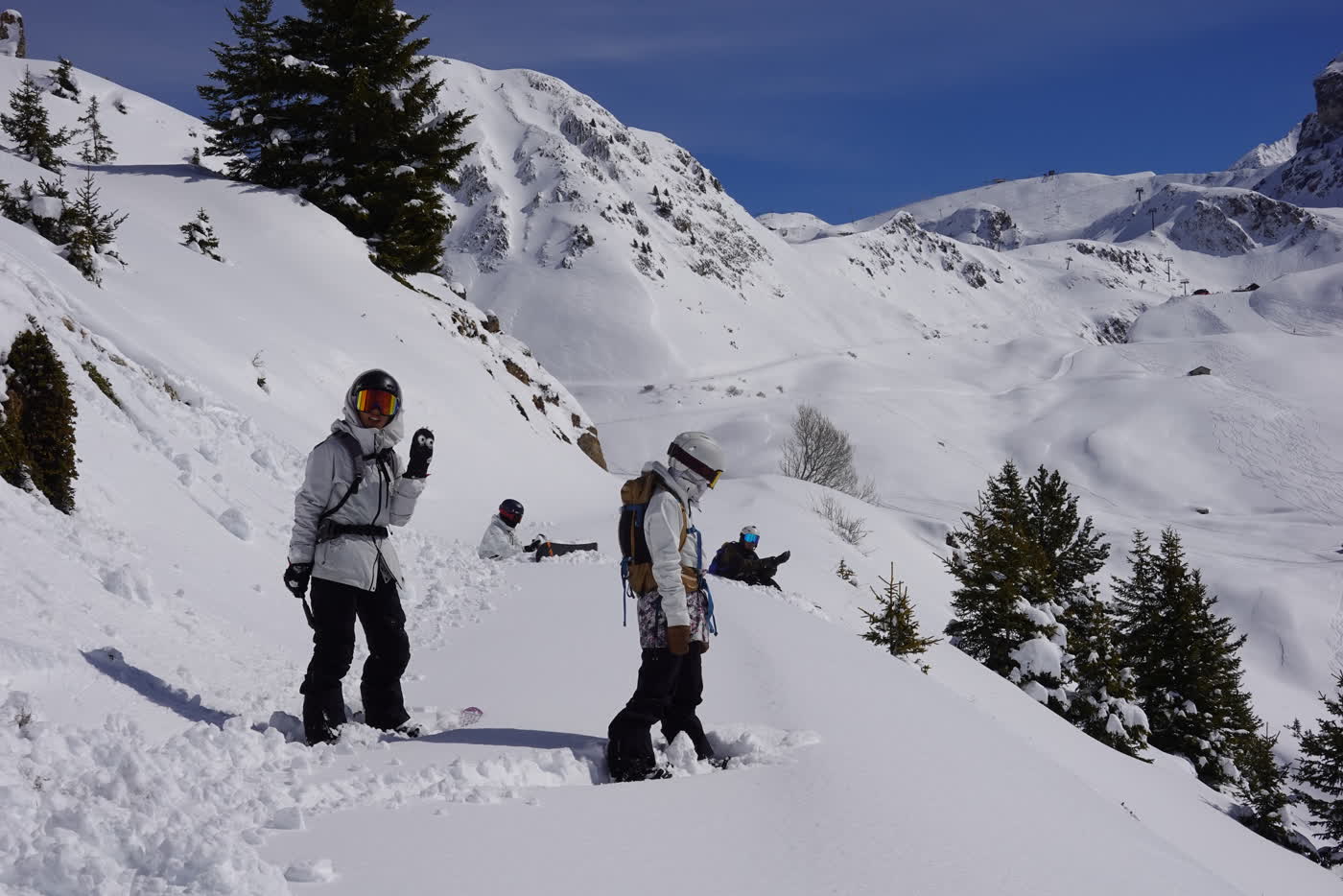 Skiers taking in the La Plagne peaks